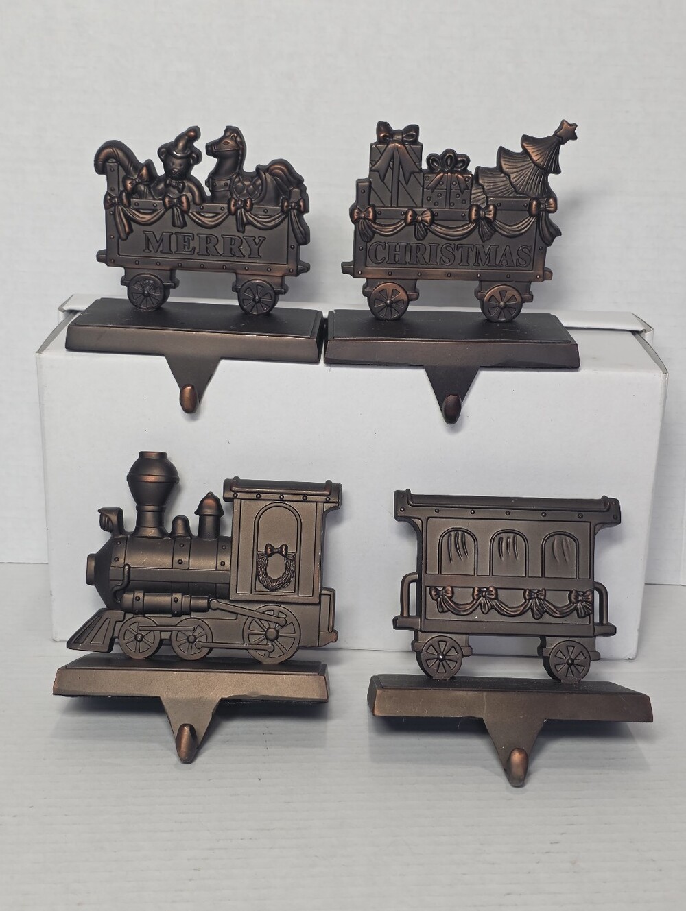 Vintage Set Of 4 Christmas Santa's Train Stocking Holders Metal Bronz Color